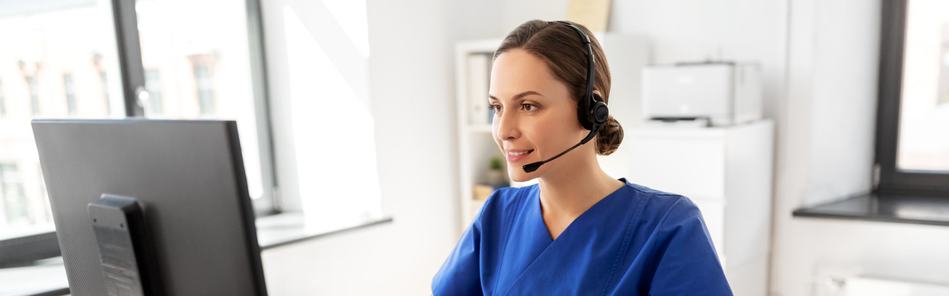 female caregiver happily taking a call